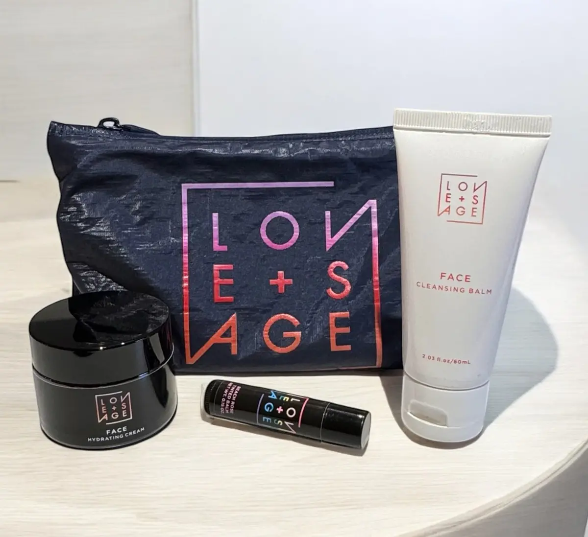 "Glow On The Go" Gift Bundle: A Cream, Cleanser, Lip Balm And Make-Up Bag! 1