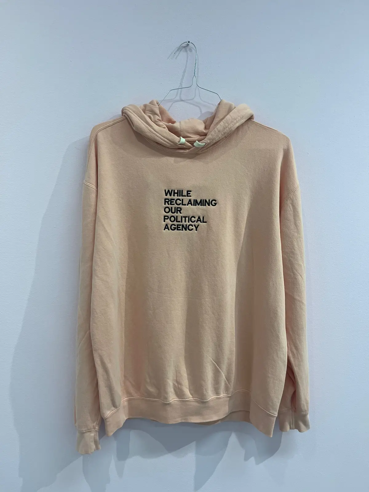 Yaz Peach Hoodie "While Reclaiming Our Political Agency" 1